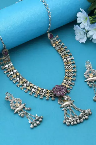 Rani color dual tone oxidised necklace set enriched with vibrant hues and elegant oxidised craftsmanship