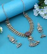 Rani color dual tone oxidised necklace set enriched with vibrant hues and elegant oxidised craftsmanship