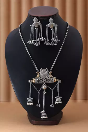 Silver color dual tone oxidised necklace set featuring classic metallic tones with ornate oxidised texture