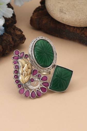 Rani & green color dual tone oxidised rings crafted with vibrant contrasting hues and ornate oxidised metalwork