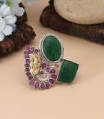 Rani & green color dual tone oxidised rings crafted with vibrant contrasting hues and ornate oxidised metalwork