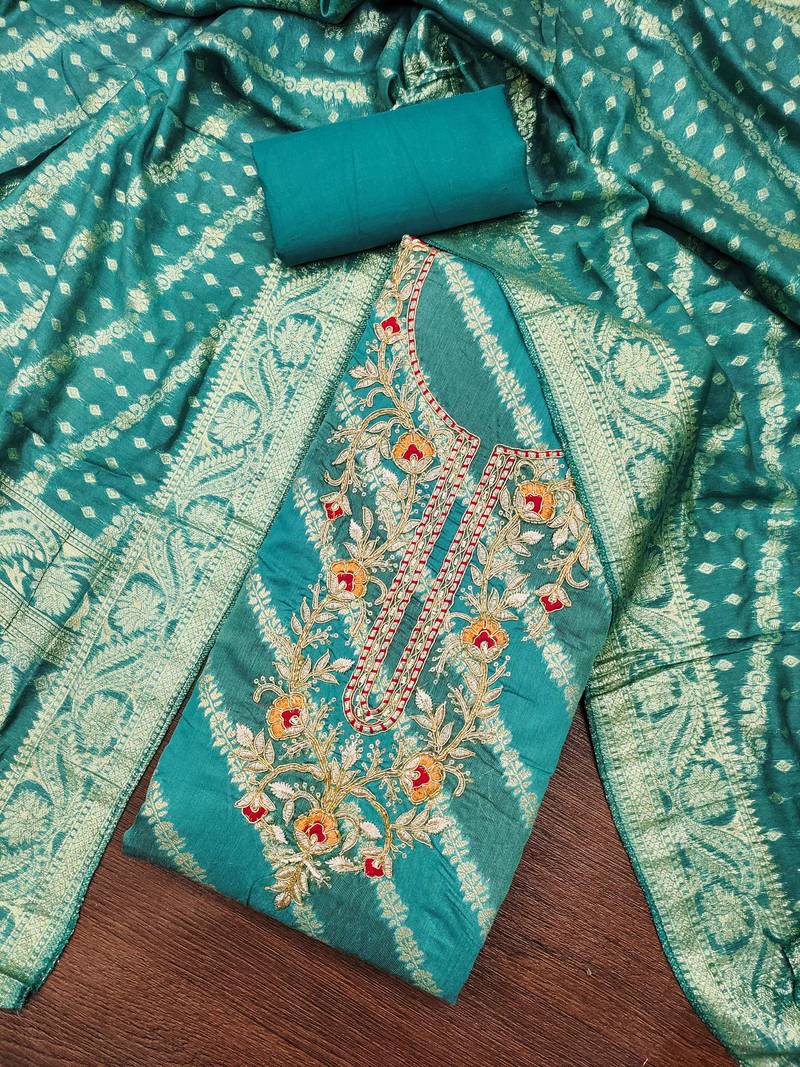 Turquoise cotton silk embroidered unstitched dress material