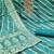 Turquoise cotton silk embroidered unstitched dress material