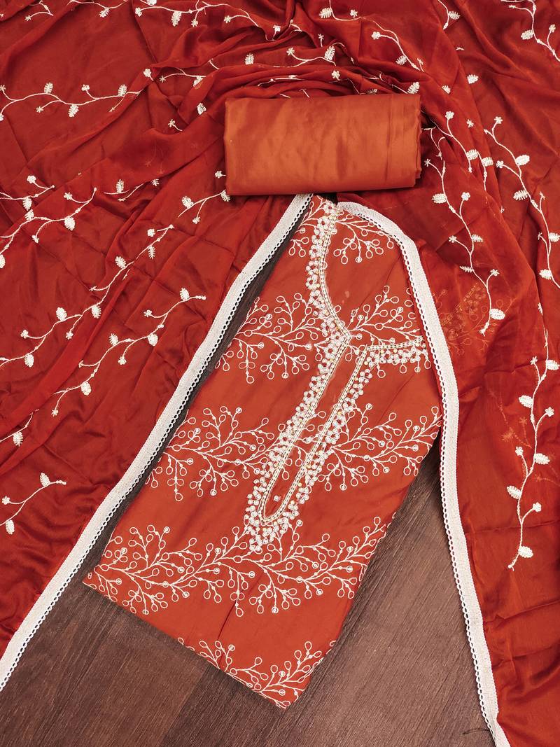 Rust cotton embroidered unstitched dress material