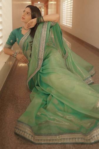 Presenting you most beautiful twill net fabrics seqwance saree With Blouse Set