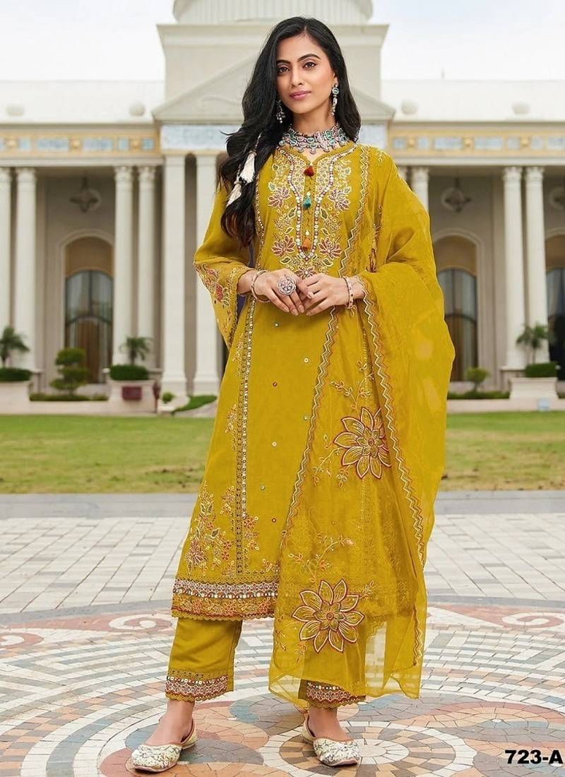 Yellow pv cotton with heavy embroidered viscose multi thread work unstitched suit