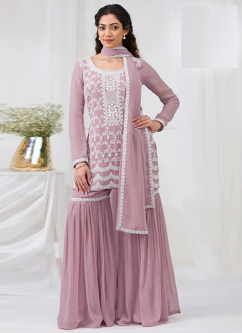 Pink faux georgette with heavy embroidery cotton thread work unstitched suit
