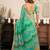 Teal green linen ikkat printed ready to wear saree with pocket