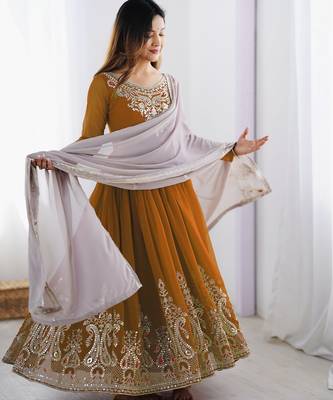 Trendy heavy georgette embroidery work mustard readymade gown 3