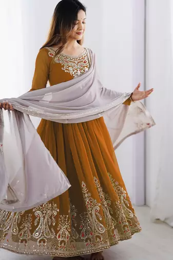 Trendy heavy georgette embroidery work mustard readymade gown