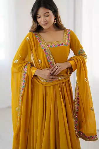 Heavy faux georgette embroidery work yellow readymade gown