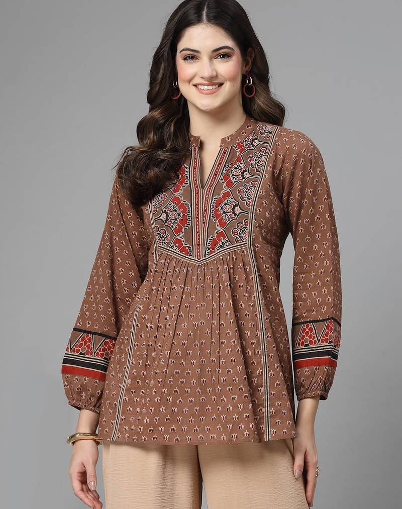 Rust brown printed top with mandarin collar, long sleeves & sequinned yoke