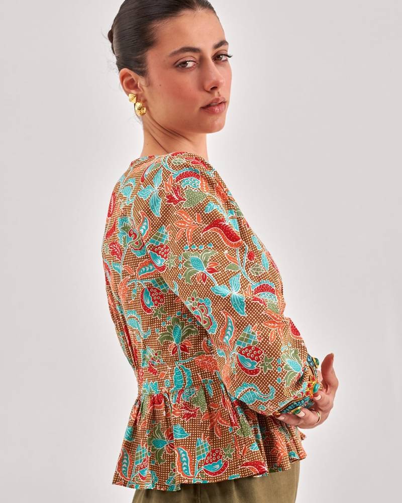 Khaki floral printed cinched waist top with v neck, long sleeves with ruffles