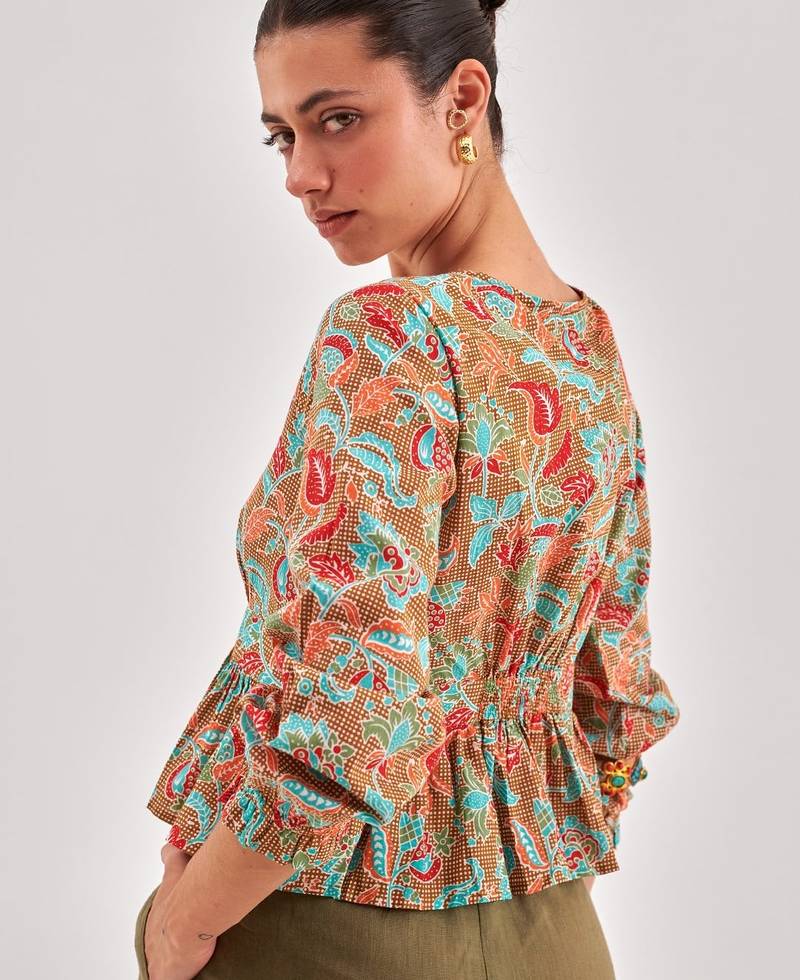 Khaki floral printed cinched waist top with v neck, long sleeves with ruffles