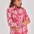 Fuchsia floral printed casual shirt with spread collar, button placket & long sleeves