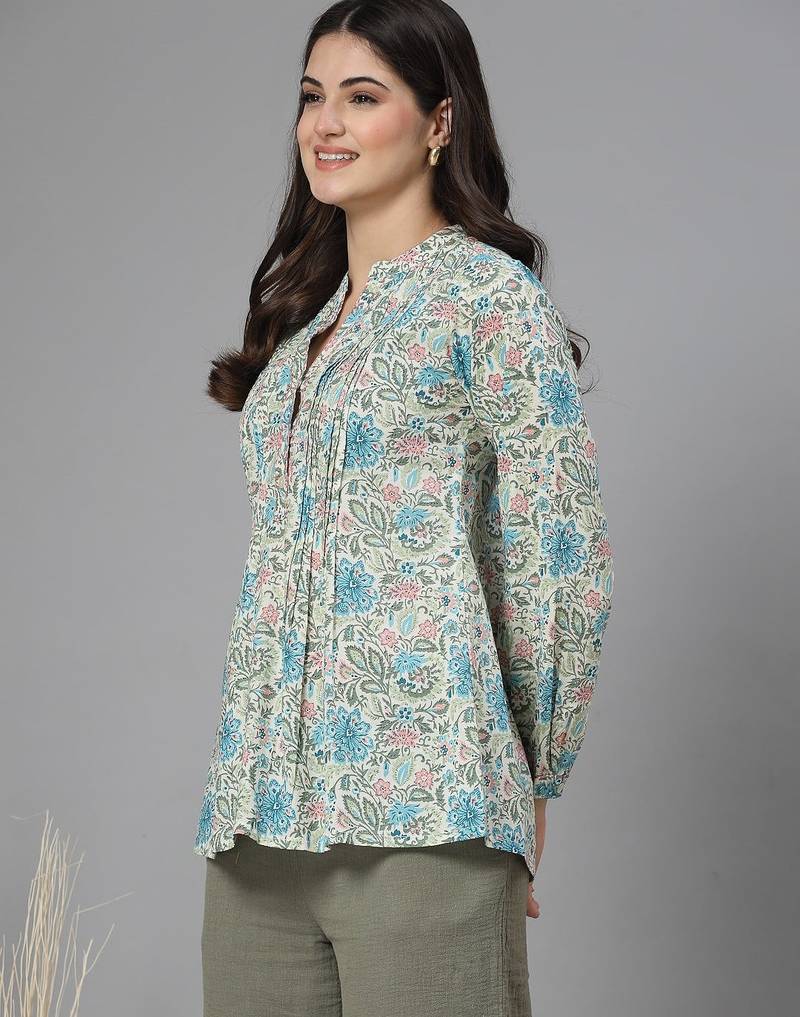 Blue and green printed top with mandarin collar, button placket & pintucks