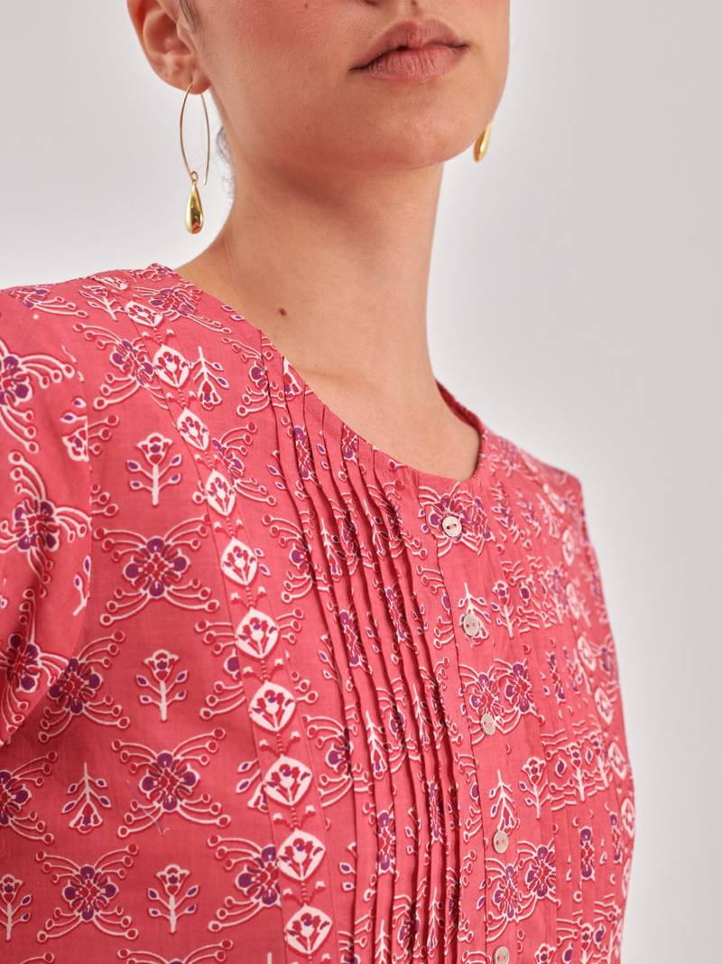 Pink printed pintuck top