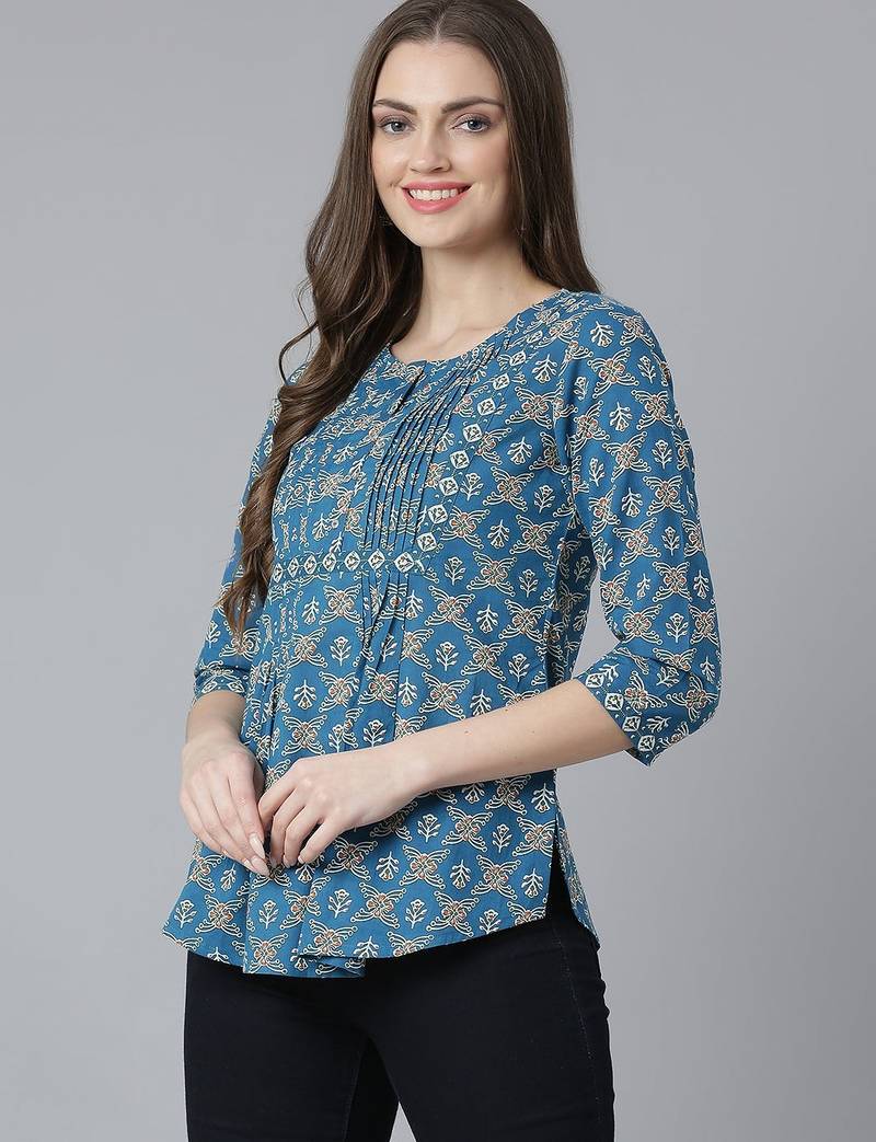Teal printed pintuck top