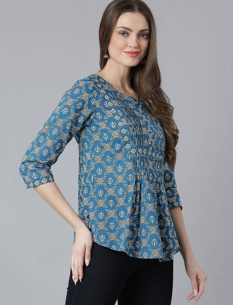 Teal printed pintuck top
