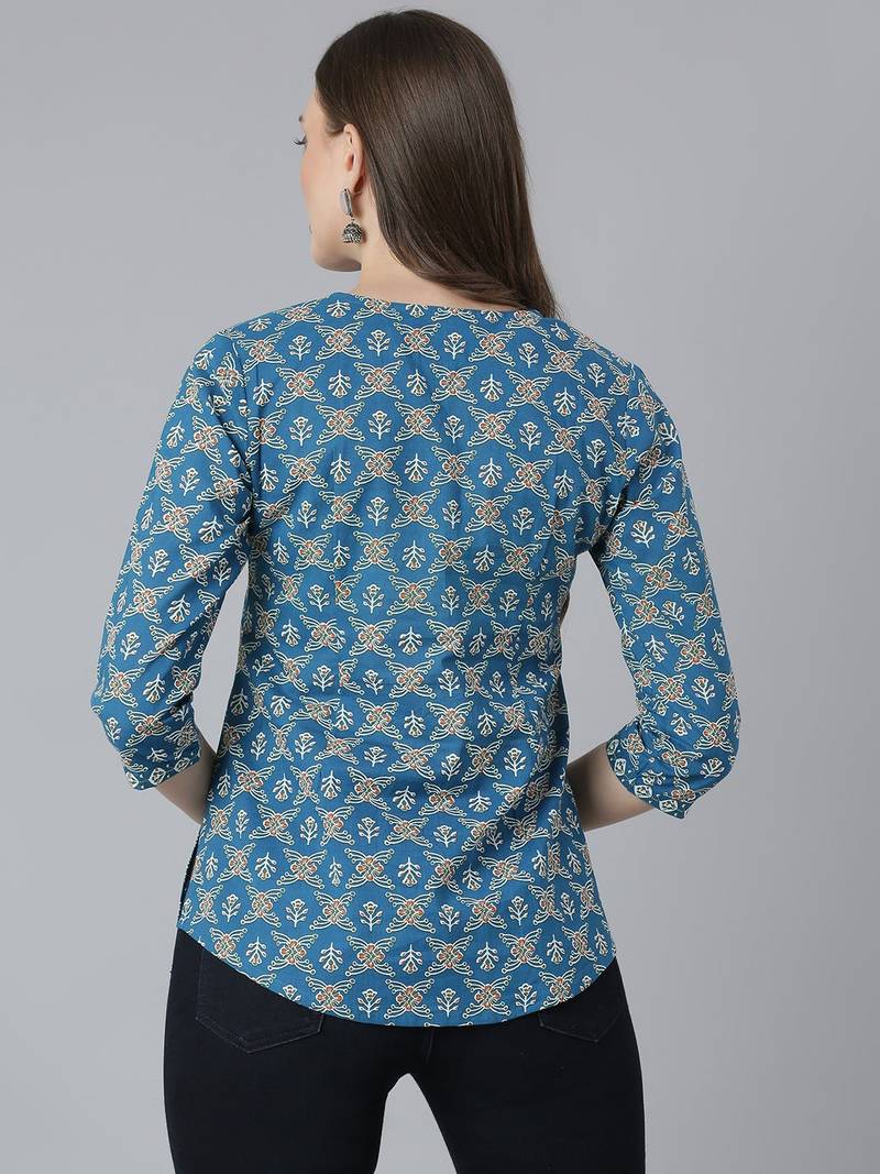Teal printed pintuck top