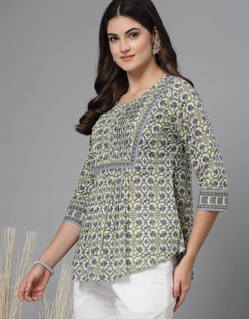 Tea green floral print pintucks top with round neck and button closure