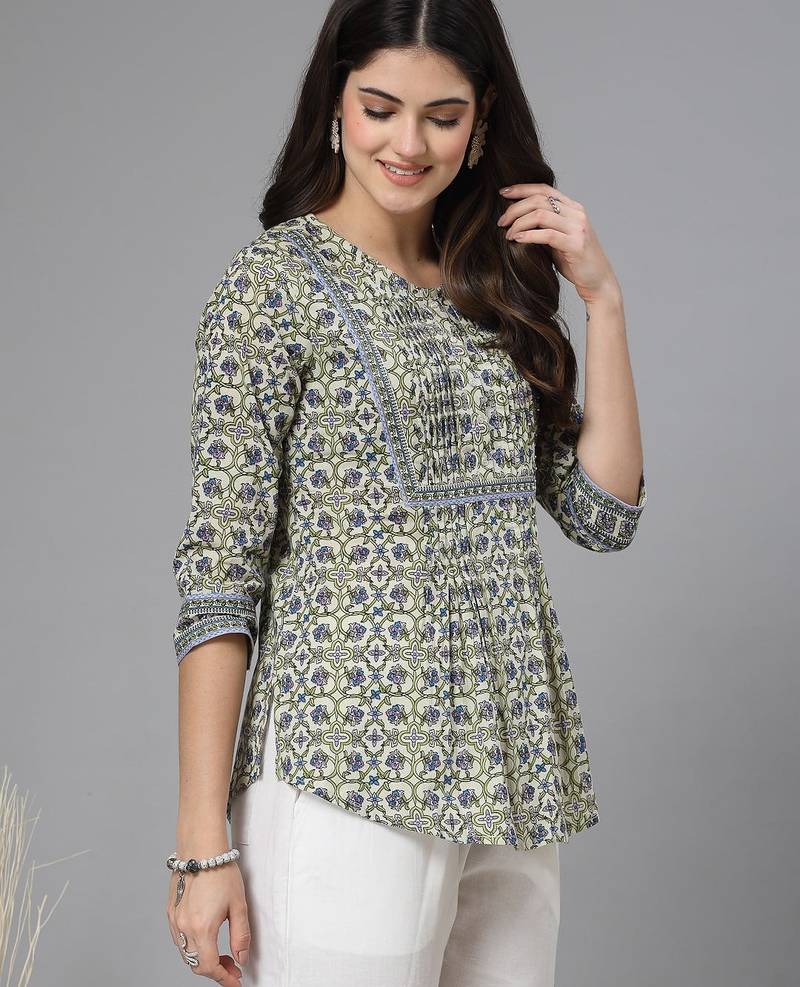 Tea green floral print pintucks top with round neck and button closure