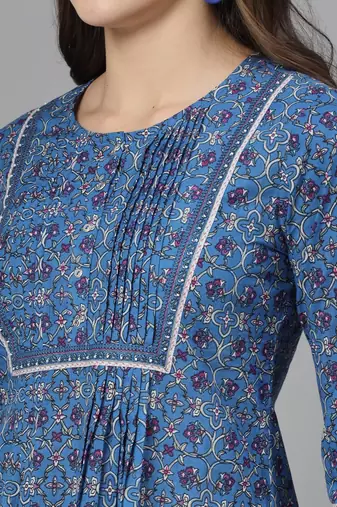 Royal blue floral print pintucks top with round neck and button closure
