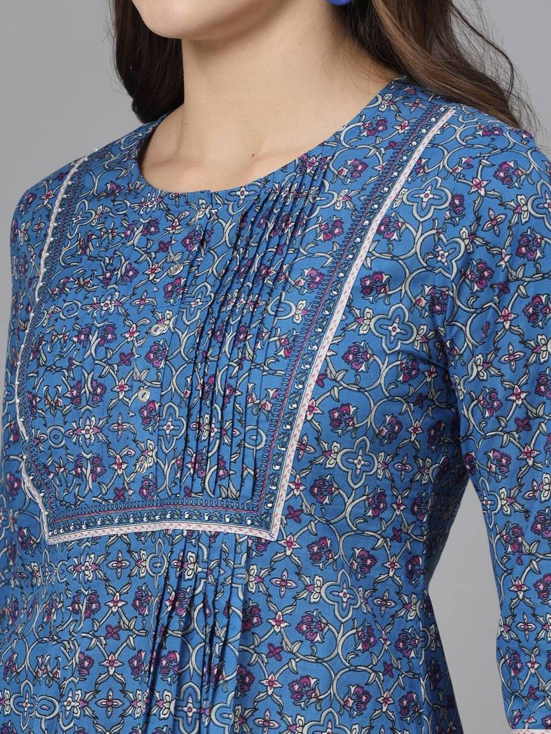 Royal blue floral print pintucks top with round neck and button closure