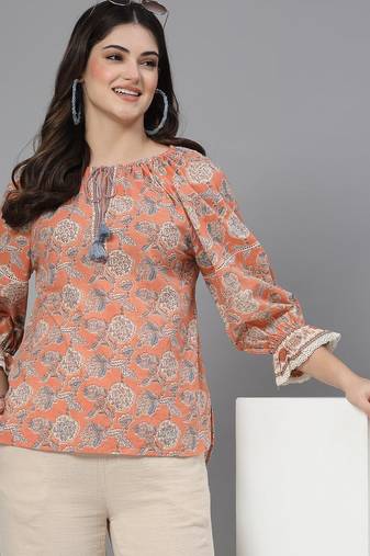 Apricot crush floral print puff sleeve cotton top with lace inserts, tie up neck & side slits