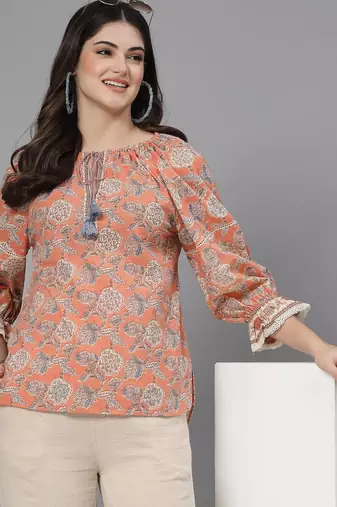 Apricot crush floral print puff sleeve cotton top with lace inserts, tie up neck & side slits