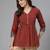 Red printed v neck top with three quarter sleeves & sequinned yoke
