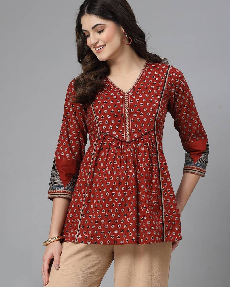 Red printed v neck top with three quarter sleeves & sequinned yoke
