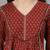 Red printed v neck top with three quarter sleeves & sequinned yoke