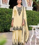 Beige chinon readymade plazzo suit with heavy embroidery work