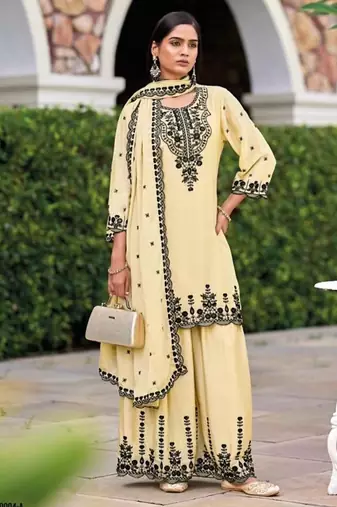 Beige chinon readymade plazzo suit with heavy embroidery 