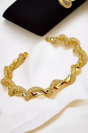 Gold plated twisted spring cuff adjustable bracelet