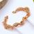Rose gold plated twisted spring cuff adjustable bracelet