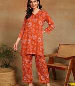 Women ethnic motifs printed orange rayon straight kurta with pants set