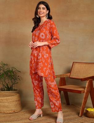 Women ethnic motifs printed orange rayon straight kurta with pants set 2