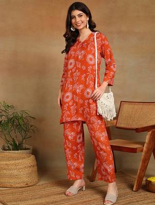 Women ethnic motifs printed orange rayon straight kurta with pants set 3