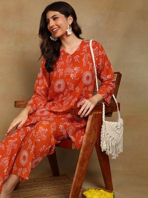 Women ethnic motifs printed orange rayon straight kurta with pants set 5