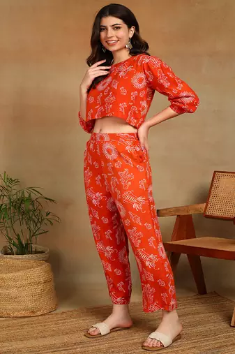 Women ethnic motifs printed orange rayon co-ord set top & straight pants with puff sleeves