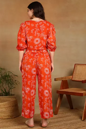 Women ethnic motifs printed orange rayon co-ord set top & straight pants with puff sleeves