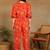 Women ethnic motifs printed orange rayon co-ord set top & straight pants with puff sleeves
