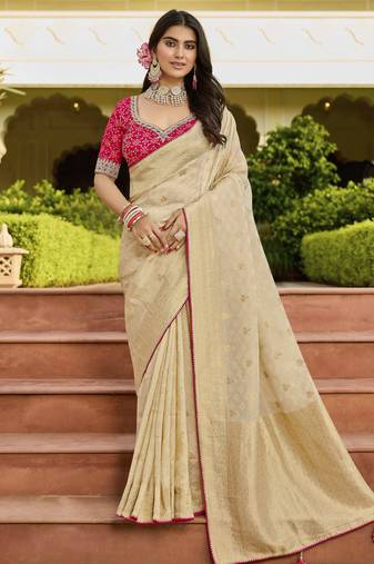 beige premium beige saree with pink embroidered blouse