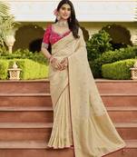 beige premium beige saree with pink embroidered blouse