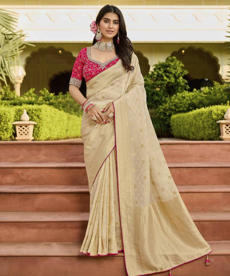 beige premium beige saree with pink embroidered blouse