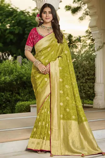 green green saree with contrasting pink blouse