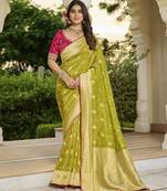 green green saree with contrasting pink blouse