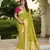 green green saree with contrasting pink blouse